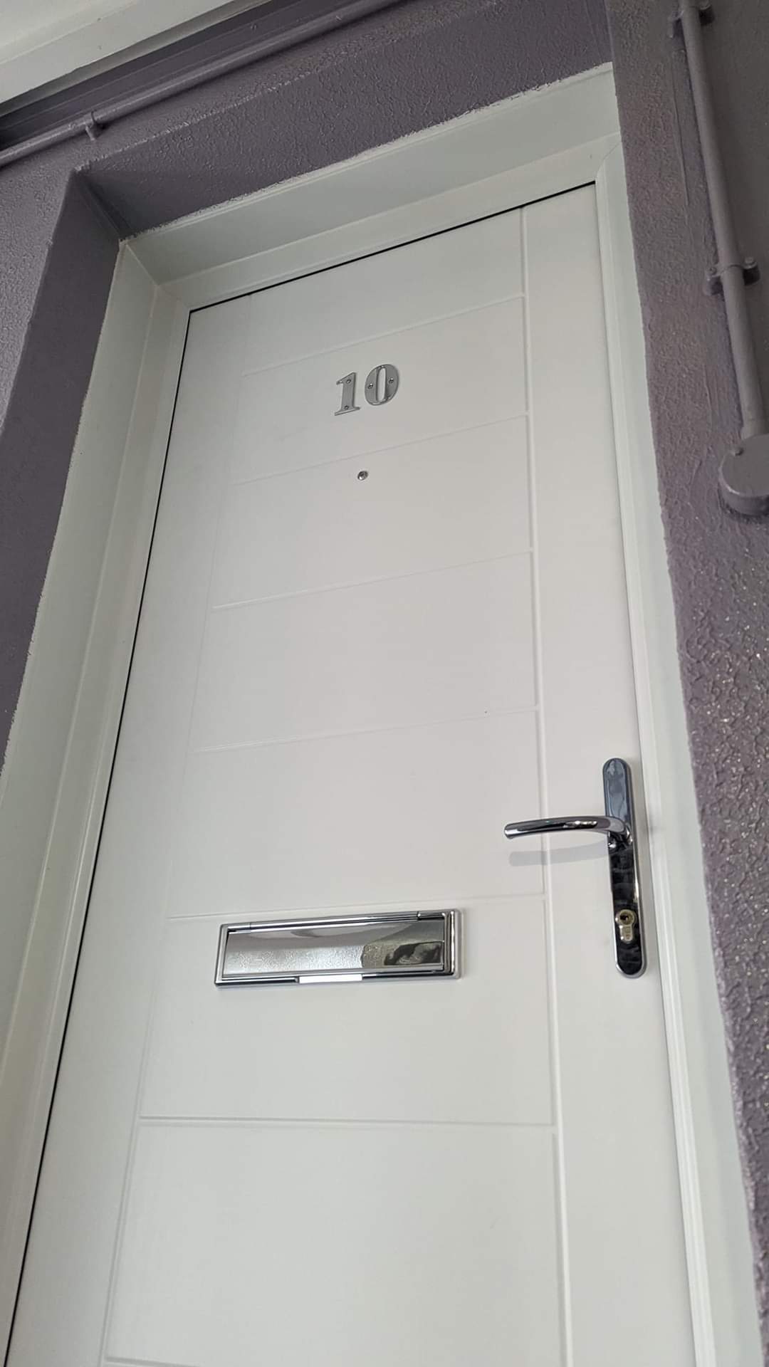 FD30 fire door installation team at work