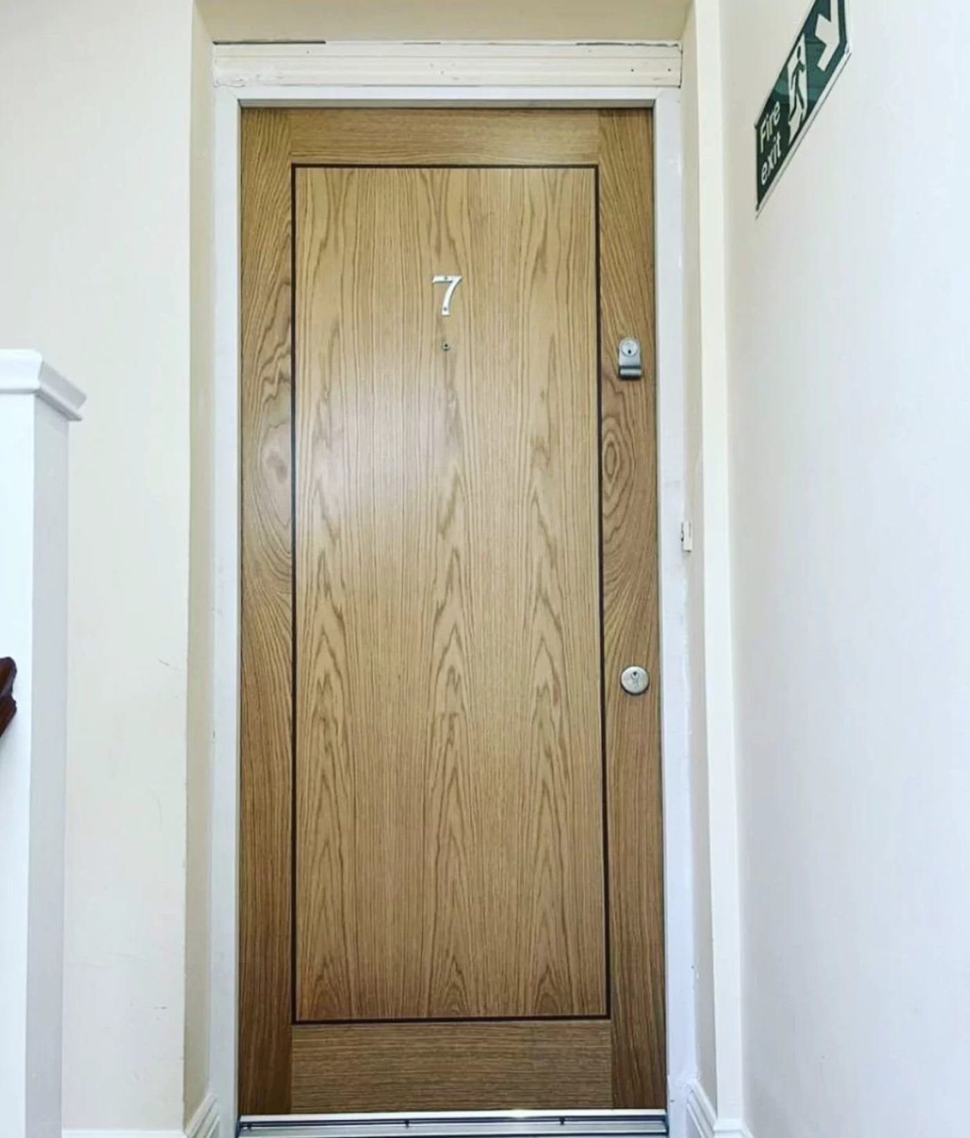 Technician conducting FD30 fire door installation